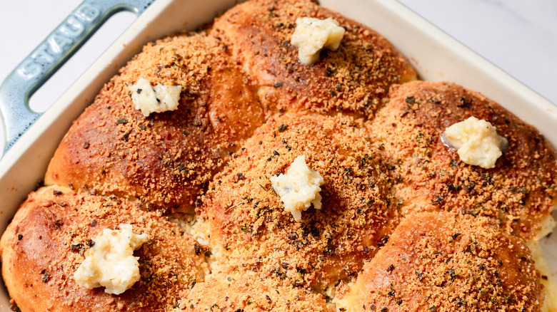 Cheesy garlic buns with compound garlic butter on each bun