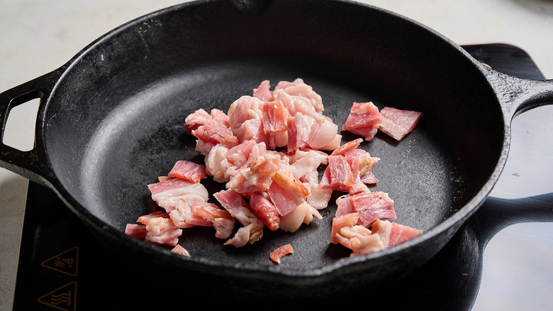 Bacon pieces in a skillet
