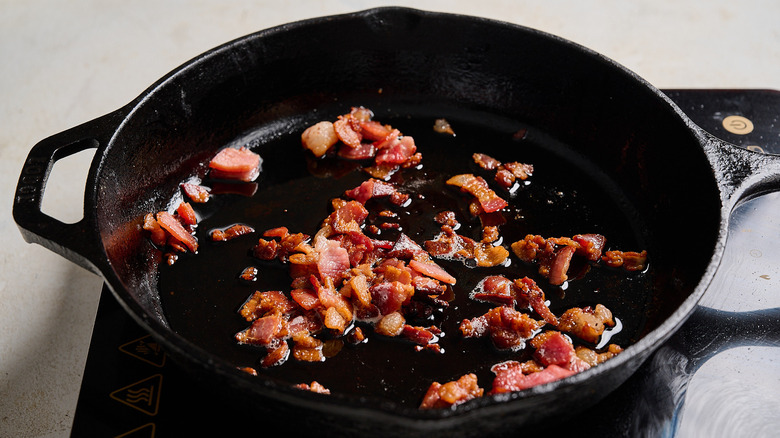 cooking bacon until crispy in a skillet