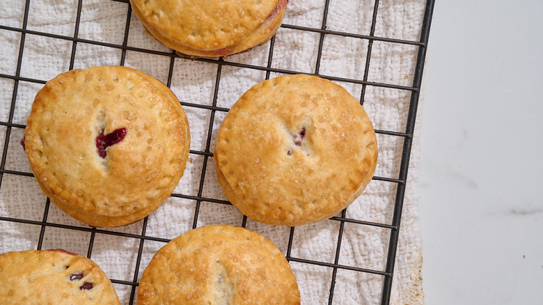 Cherry hand pies on a wire rack