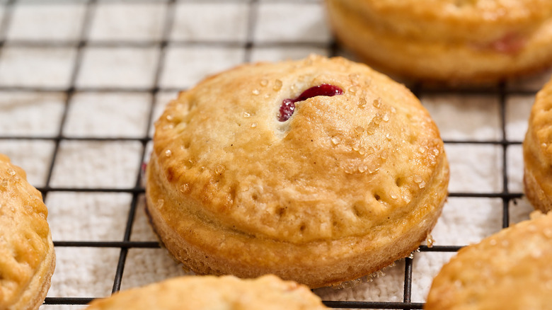 cherry hand pie on a wire rack