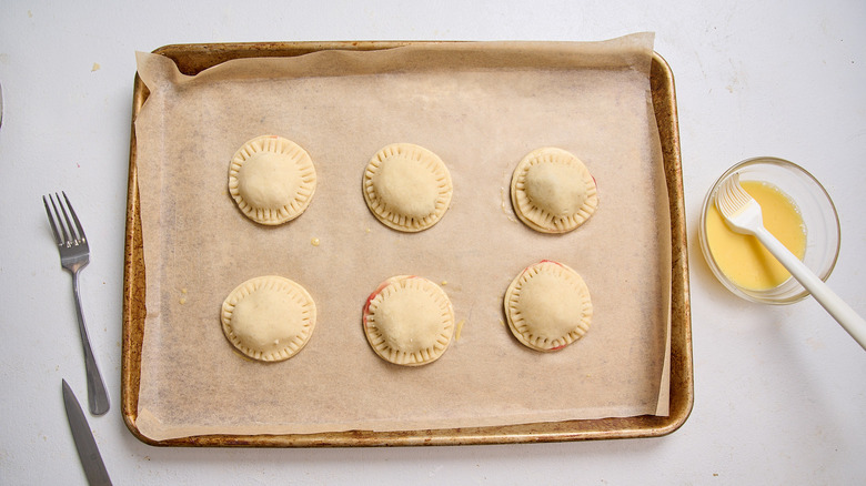 Crimped pie crusts closed with a fork