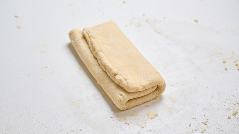 Dough folded on a table