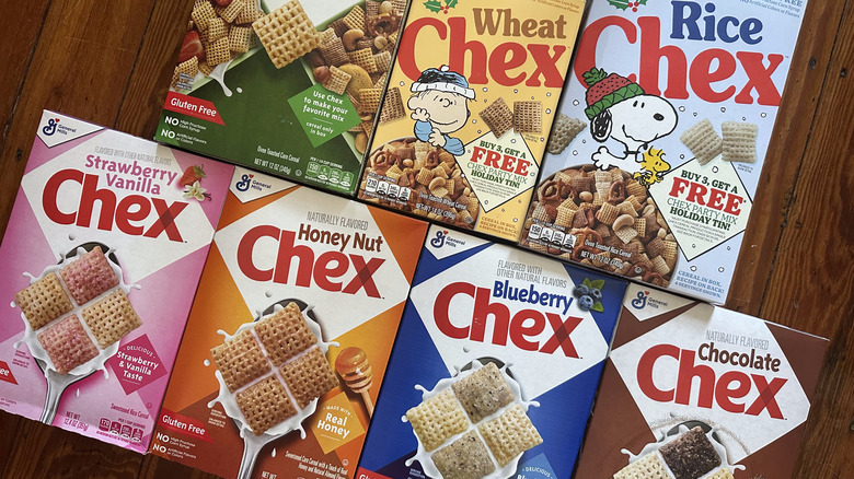 Top view of Chex cereal boxes arranged on wooden background