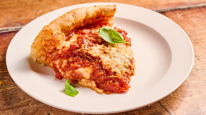 deep dish pizza on a plate