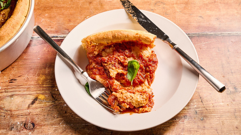 deep dish pizza slice on a plate