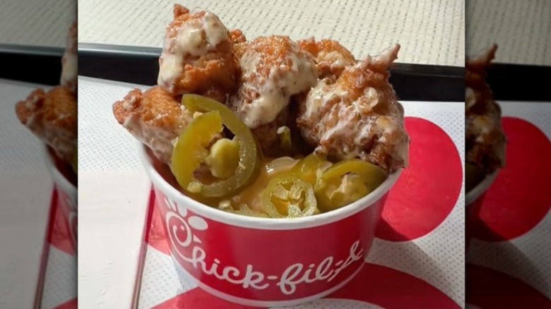 Chick-fil-A mac and cheese with chicken and sauce