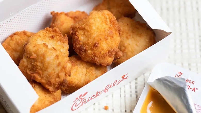 Chick-fil-A nuggets in box with sauce packet