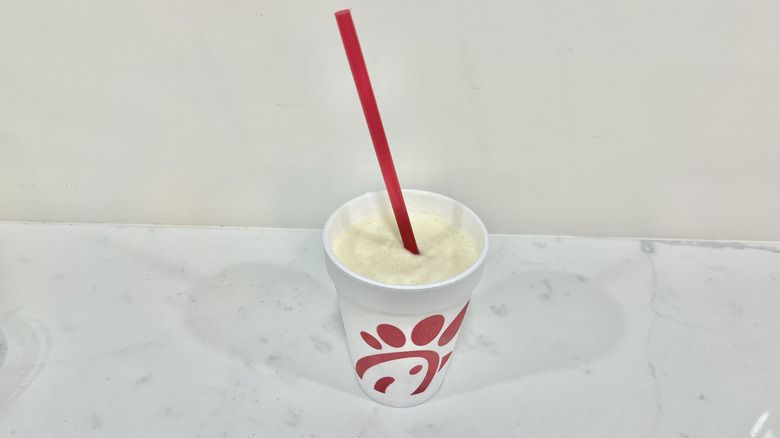 A cup of Chick-Fil-A Frosted Lemonade on white countertop