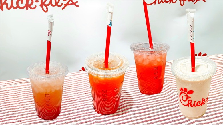 Four Chick-fil-A strawberry hibiscus drinks on table