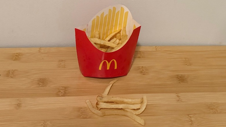 A container of McDonald's french fries on a table