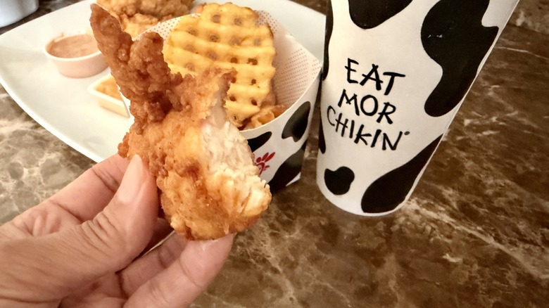 closeup of Chick-fil-A's chicken tender with a bite taken out of it
