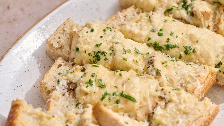Close up of chicken Alfredo garlic bread slices