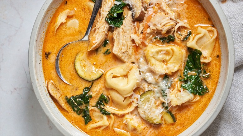 chicken and tortellini soup in bowl
