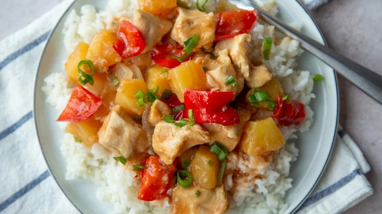 Slow Cooker Sweet and Sour Chicken Breast on bed of white rice