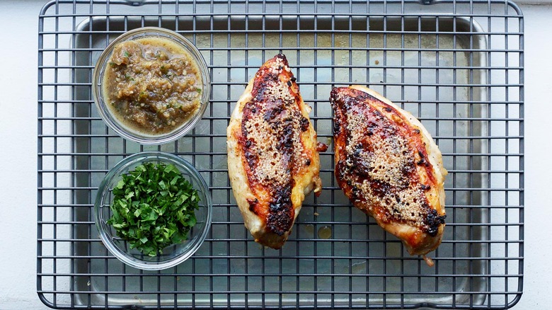 chicken breasts on grilling tray