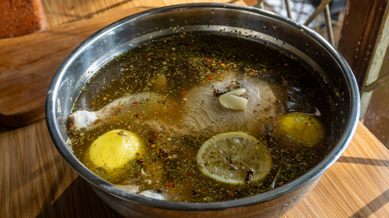 chicken in a bowl of brine