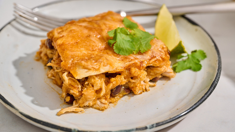 slice of enchilada casserole on a plate