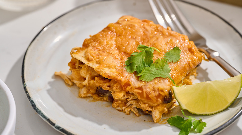 slice of enchilada casserole on a plate