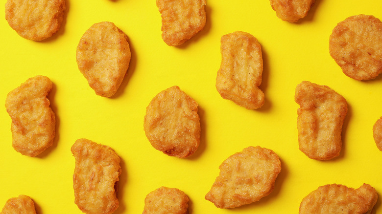 Chicken nuggets on a yellow background