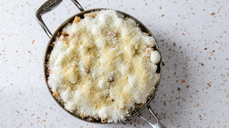 Cheese-topped chicken parmesan ziti in a pan