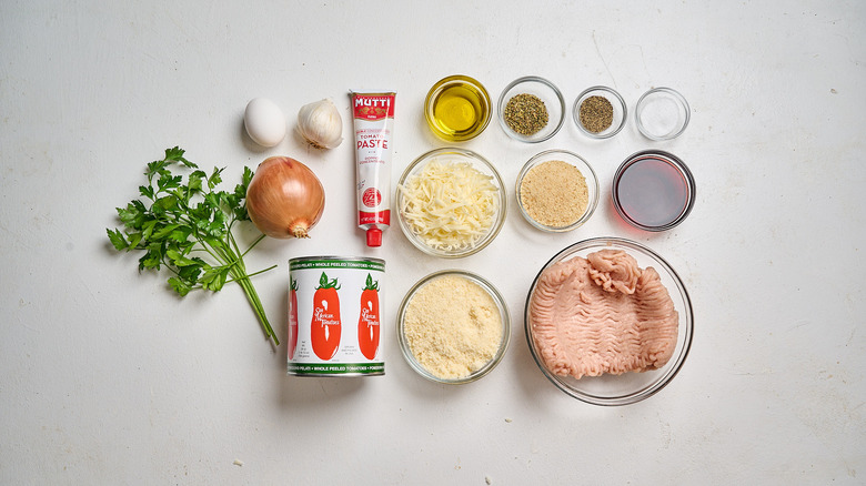 Chicken parmesan ingredients on a table