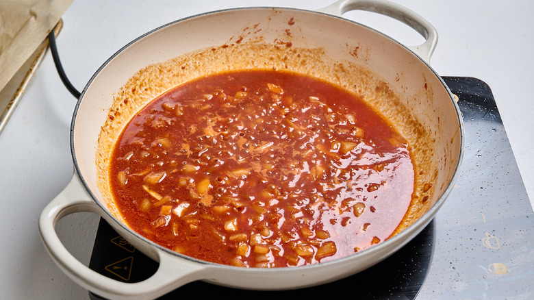 cooking onion and garlic in red wine
