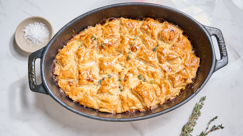 garnished pot pie on a table