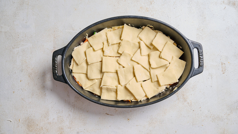 puff pastry squares on a casserole dish