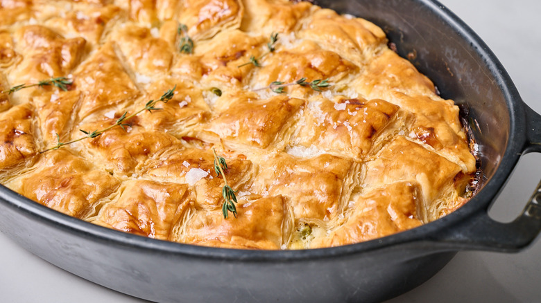 flaky crust of puff pastry on casserole
