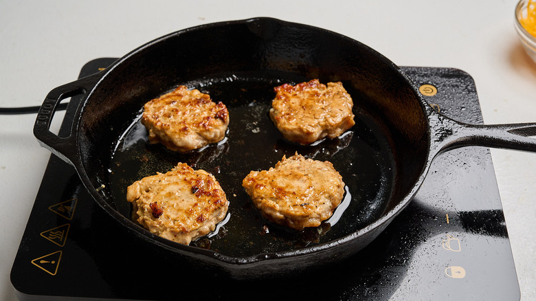 Browning sausage in a skillet