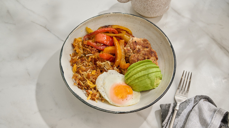 chicken sausage hash brown bowl on a table