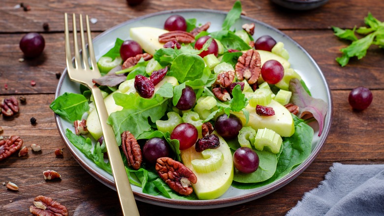 Traditional Waldorf salad with grapes and walnuts