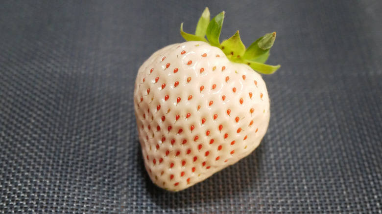 White strawberry with red seeds