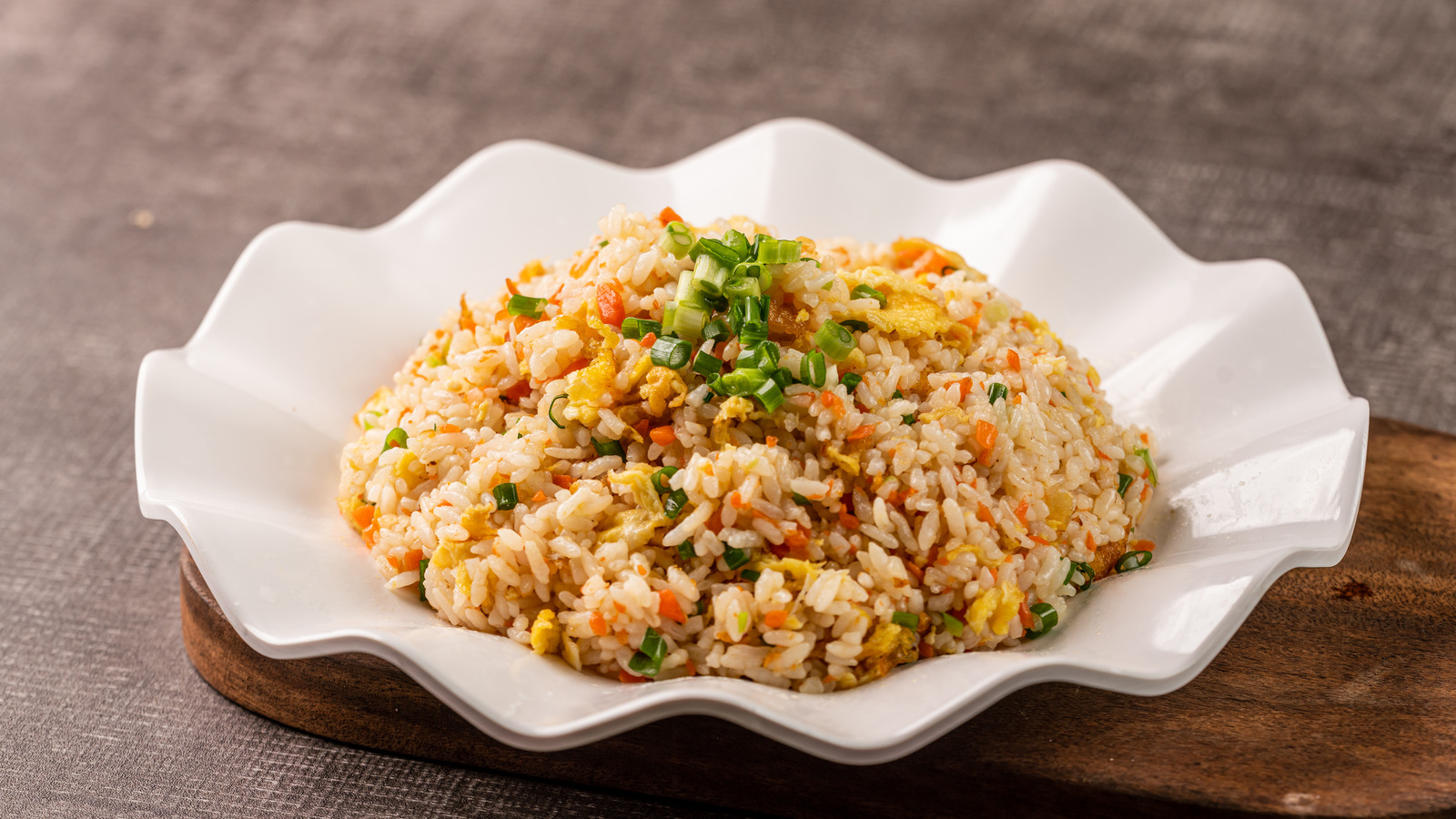 Premium Photo  Fried rice with pork and fried egg in japanese