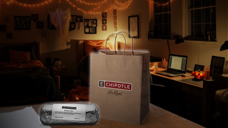 Chipotle burrito and bag in Halloween-decorated room