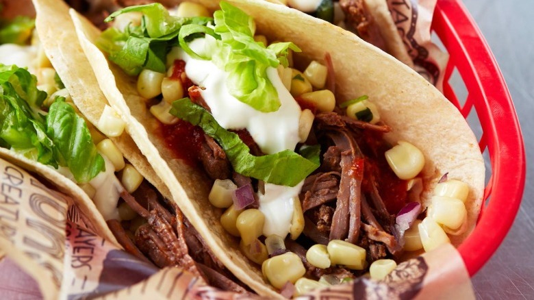 baskets of Chipotle barbacoa tacos