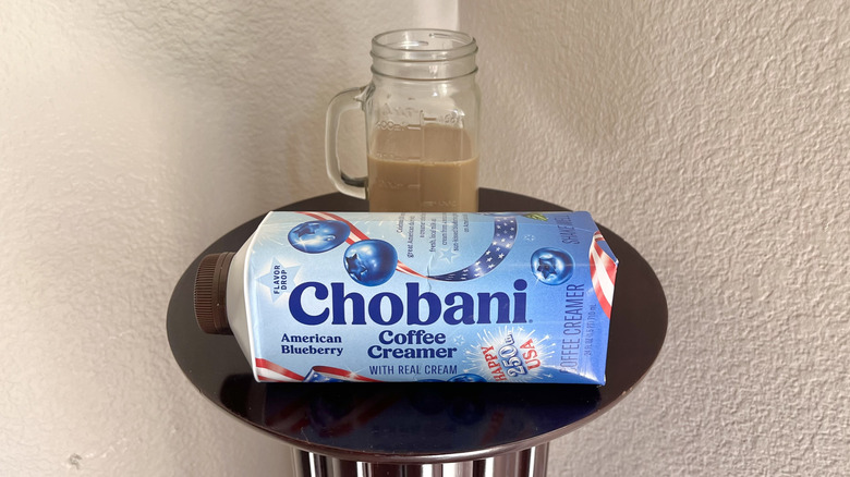 Chobani American Blueberry creamer and coffee on a table