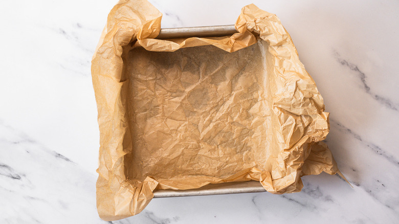 Lined baking pan with parchment paper