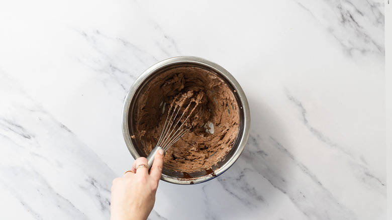 Making chocolate cream in bowl