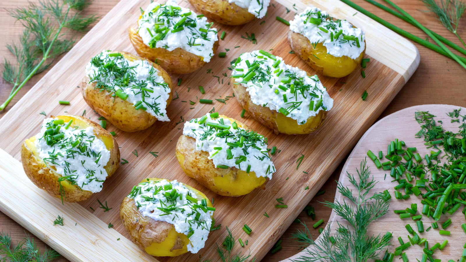 Choose Chives Over Scallions For A Better Baked Potato