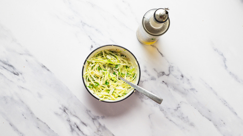 Cabbage slaw and olive oil.