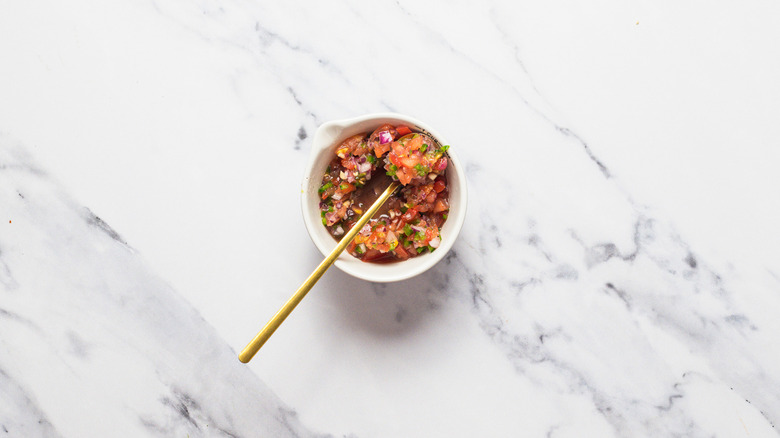 Pico de gallo in small bowl.