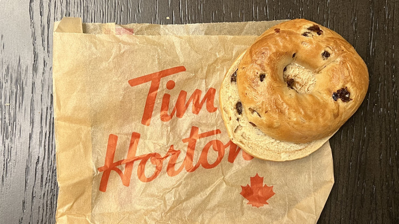 Tim Hortons cinnamon raisin bagel on to-go bag.