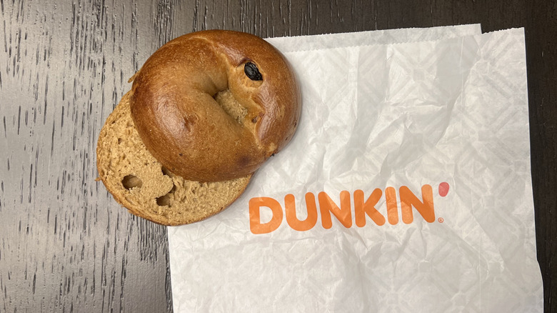 Dunkin' cinnamon raisin bagel on to-go wrapper.