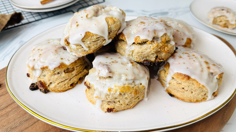 Glazed cinnamon raisin biscuits in serving platter