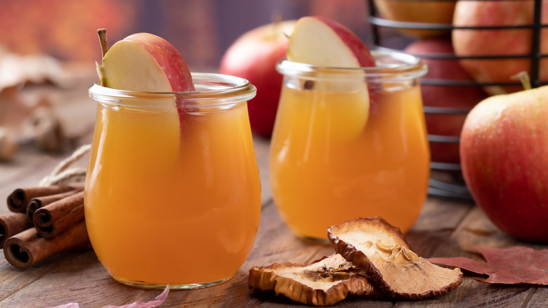 Two glasses of apple cider