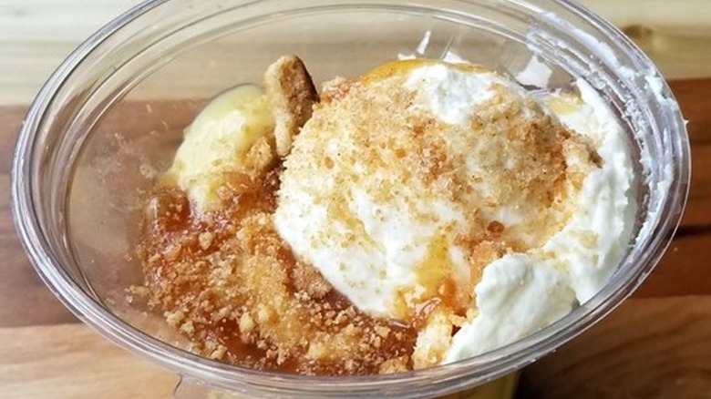 A plastic tub of banana pudding from City Barbecue