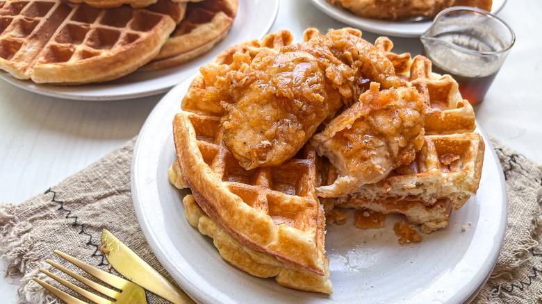 chicken and waffles on plate