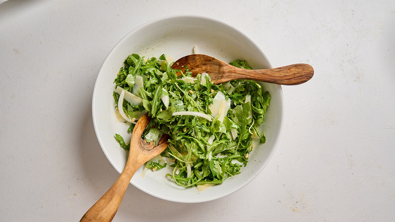 salad tossed with dressing
